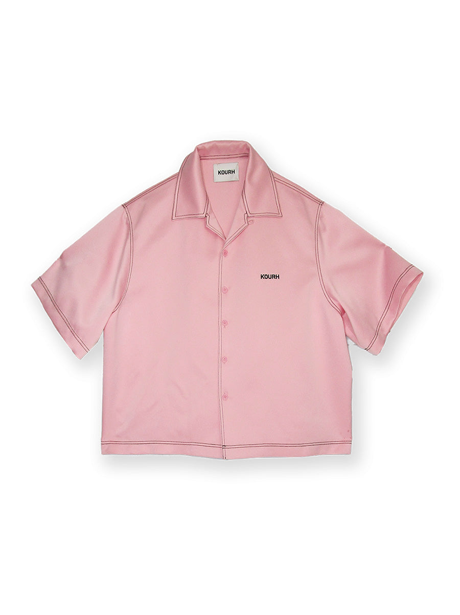 This BOTANY SHIRT is made from heavy satin, with contrast stitching and an embroidered Kourh logo. Its sophisticated design and classic colour make it perfect for any style or occasion. Over-sized fit Embroidered logo Contrast Stitching  Straight fit Unlined Front button closure Short sleeves Cropped