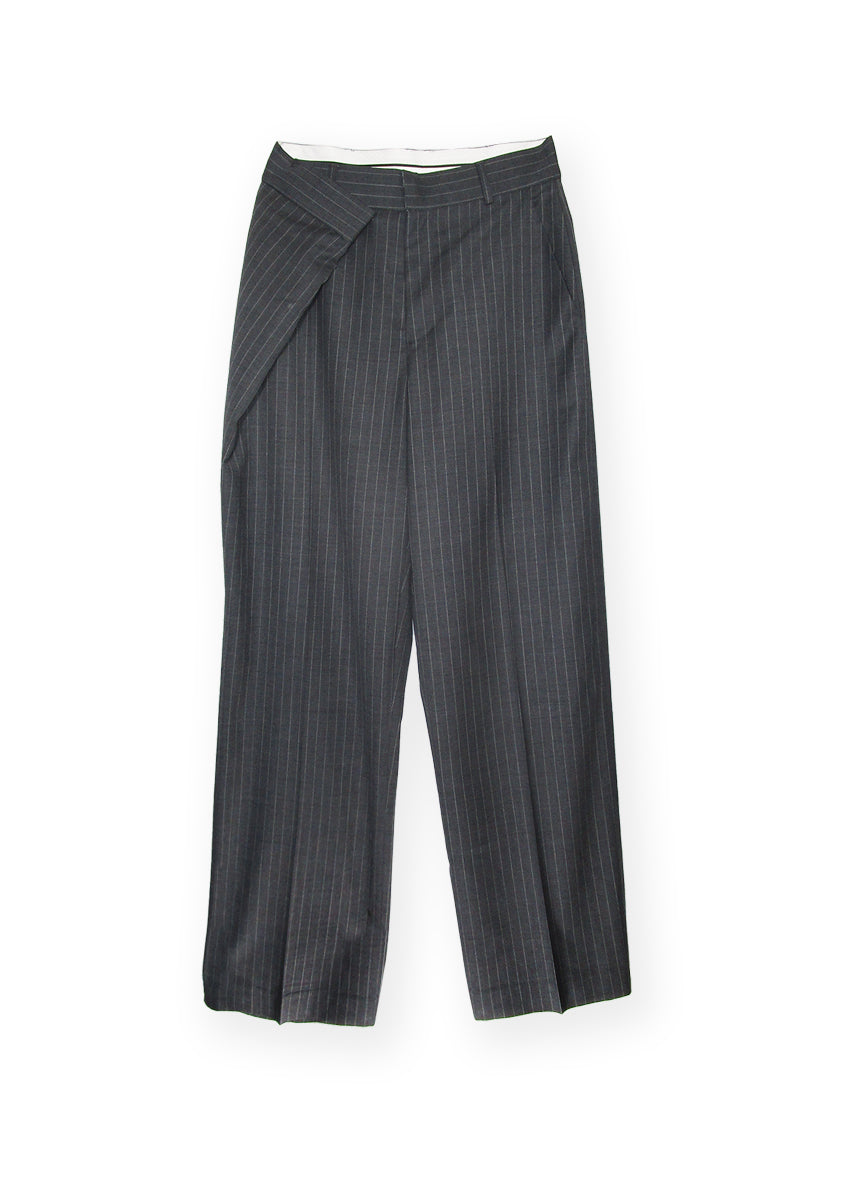 The Nectar wool trouser features internal waist-banding for a comfort and a fold over wrap detail. With a straight leg design and high-quality wool construction, it's a versatile and stylish addition to any wardrobe, perfect for both casual and formal occasions. Fold over detail, Wool blend (dead stock), Straight leg, Fly front